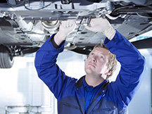 Mechanic working on car